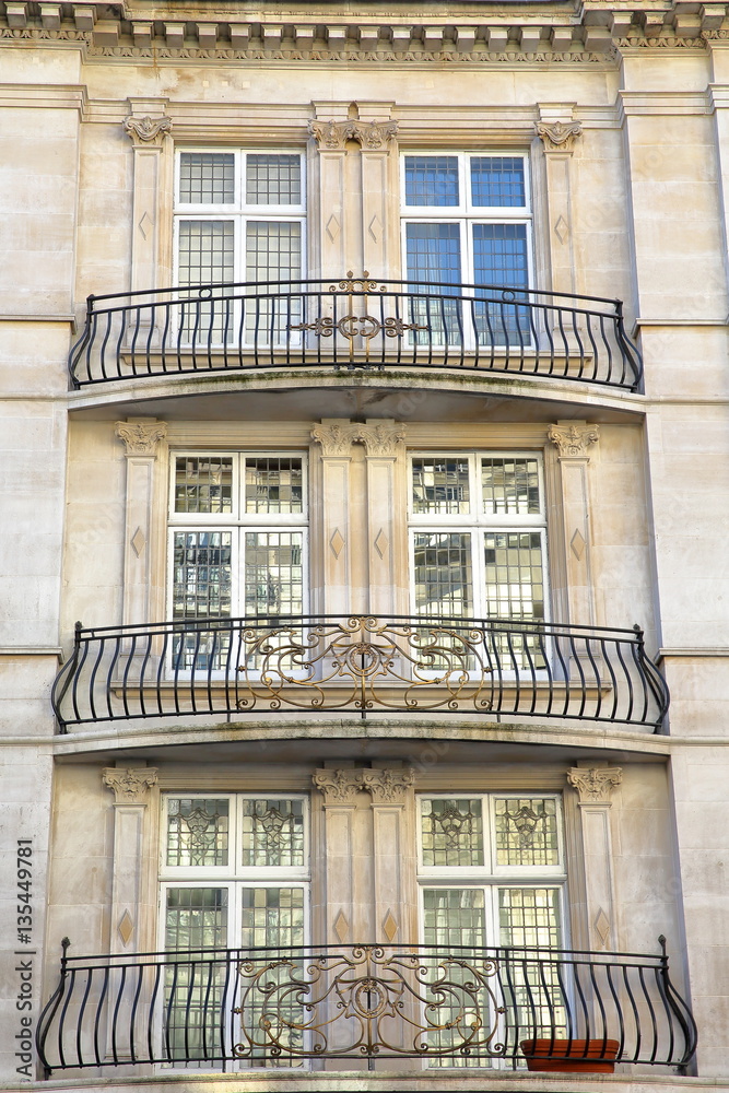 LONDON, UK: Victorian houses facades in the borough of Westminster with wrought iron railing