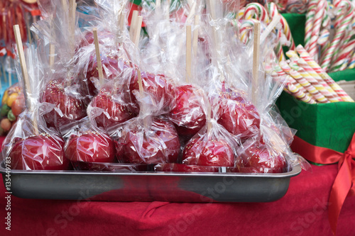Candied apples on a sticks in cellophane