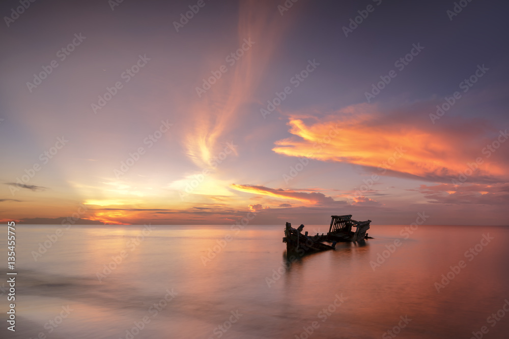 Wreck fishing boat next to the beach, Thailand U-Tapao Airport. Wrecked boat abandoned stand on beach or Shipwrecked off the coast of Thailand. Wreck fishing boat next to the beach, Thailand U-Tapao Airport. Wrecked boat abandoned stand on beach or Shipwrecked off the coast of Thailand.