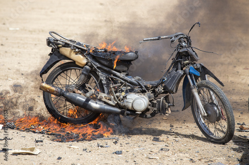 flame burned motorcycle from explosive in forensic training