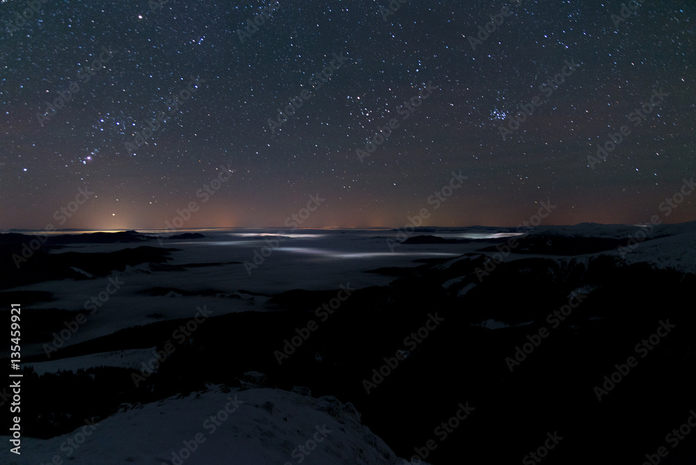 night photo of the mountains,  the starry sky