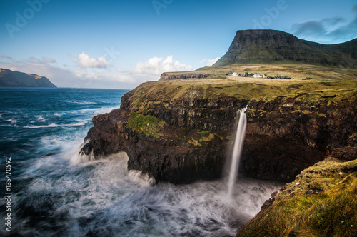 Waterfall above the sea near Gasadalur village, Faroes Islands