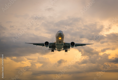 Landscape of sunset with Plane at Nai Yang Beach, Phuket Provinc