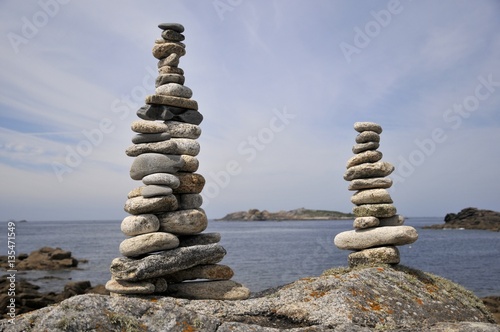 stone towers in front of the sea