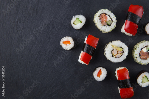 Sushi platter on dark background