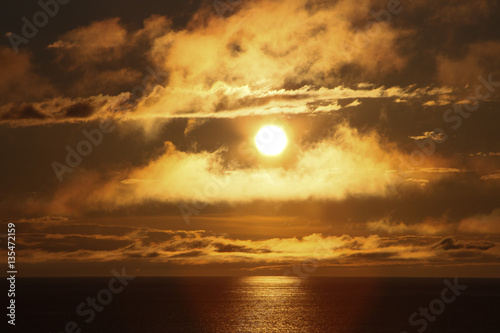 Clouds at sunset over the sea, sunset over the sea © Mihai