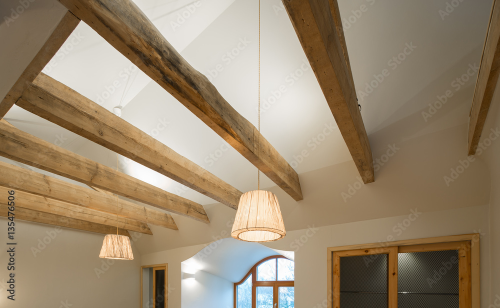 Obraz premium Wooden interior design. Wooden beams and floor to ceiling as a d