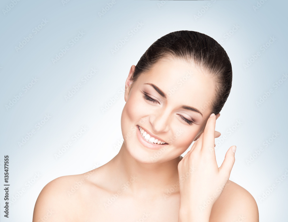 Close-up portrait of attractive and happy caucasian girl with a Close-up portrait of attractive and happy caucasian girl with a