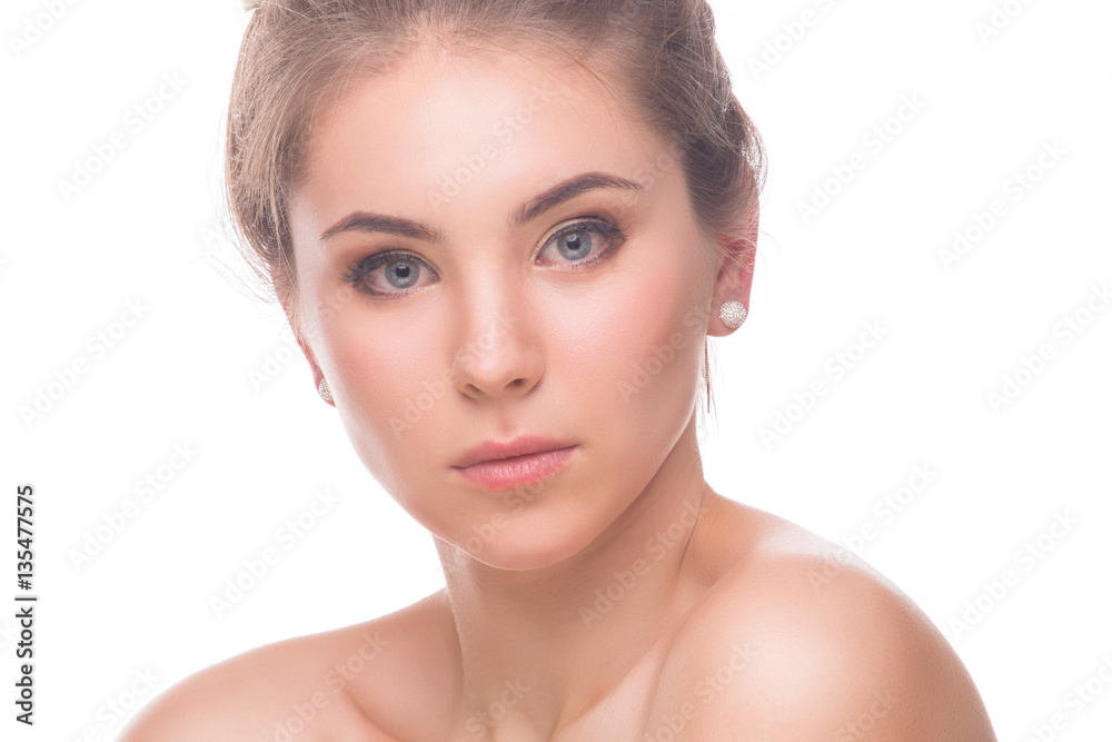 Beautiful Young Woman isolated on a White Background. Touching Her Face. Fresh Clean Skin. Beautiful Young Woman isolated on a White Background. Touching Her Face. Fresh Clean Skin.