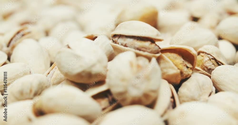 Dried roasted salted appetizing pistachios rotating Dried roasted salted appetizing pistachios rotating