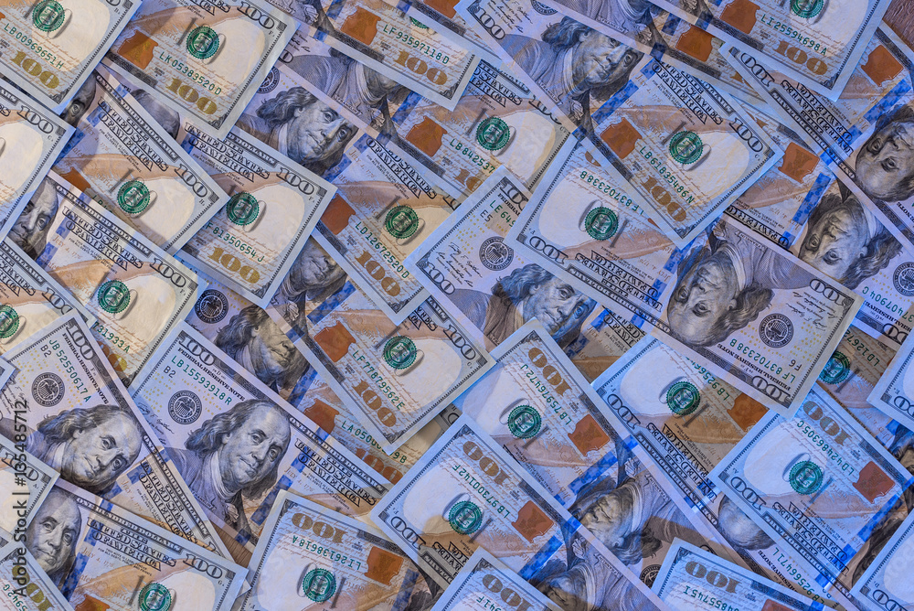 Background of new 100 dollar bills. close up. Background of new 100 dollar bills. close up.