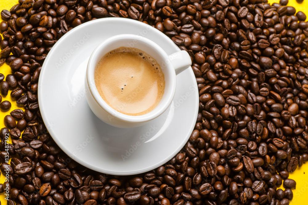 Cup of coffee and beans Cup of coffee and beans