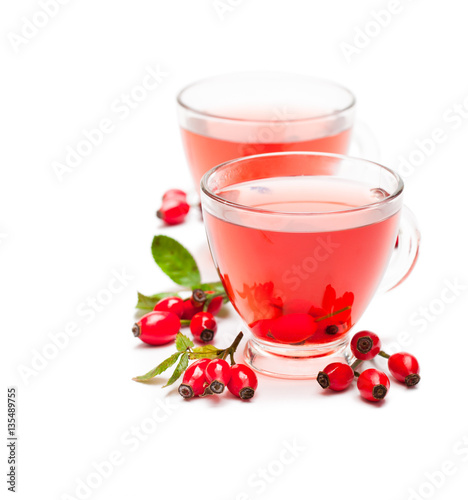 Fresh  tea with rosehip isolated on white