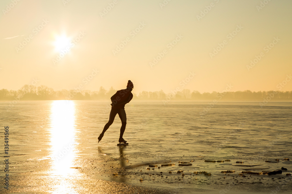 Ice skating in winter landscape