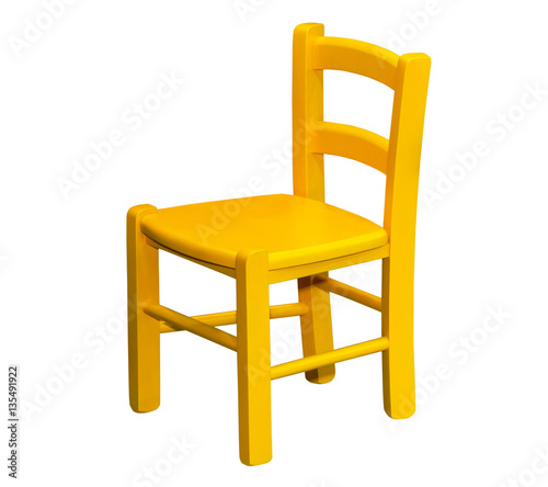 Kids wooden yellow chair isolated on white background
