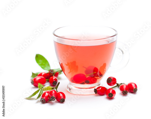 Fresh  tea with rosehip isolated on white