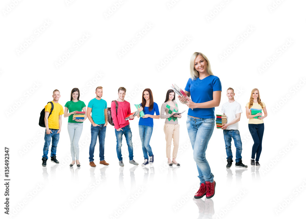 Obraz premium Large group of teenage students isolated on white background. Many different people standing together. School, education, college, university concept.