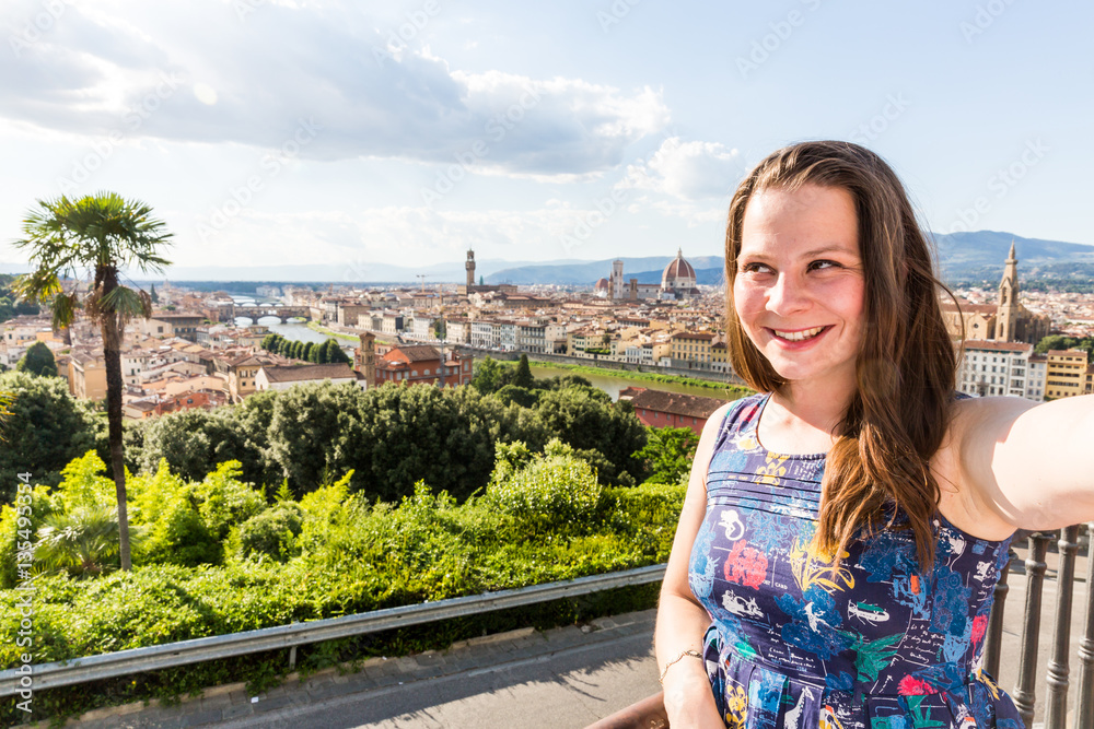 View of a girl at the Michelangelo Square in Florence in Italy