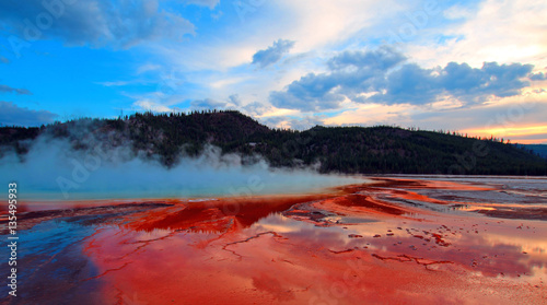 Grand Prismatic Spring under sunset clouds in the Midway Geyser Basin in Yellowstone National Park in Wyoming U S A
