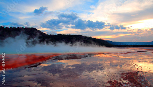 Grand Prismatic Spring under sunset clouds in Yellowstone National Park in Wyoming USA