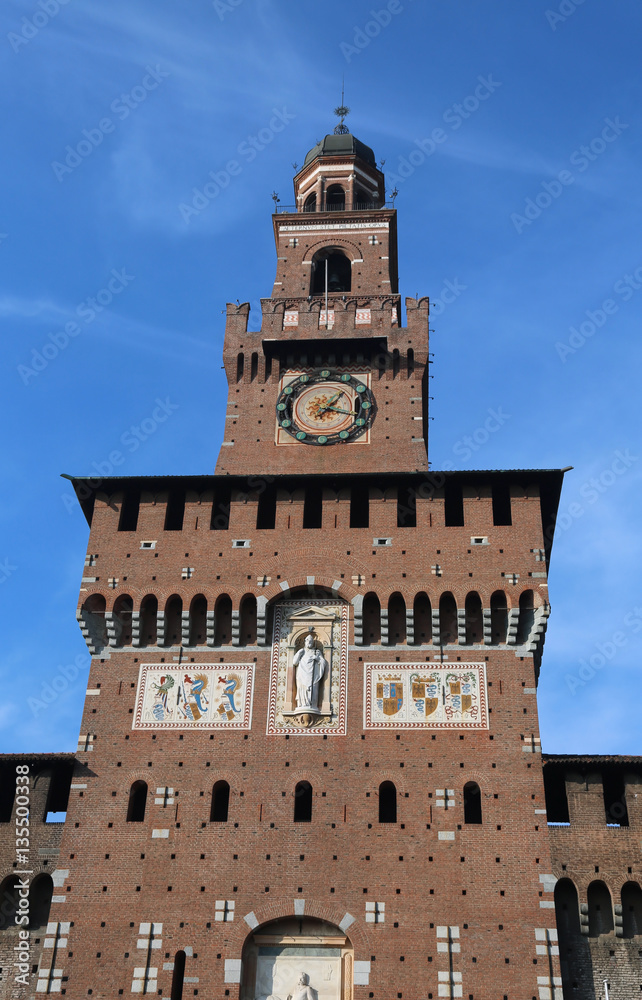 big clock tower of Castle called Castello Sforzesco in Milan