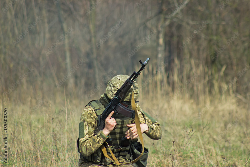 Military with kalashnikov at tactical exercises Military with kalashnikov at tactical exercises