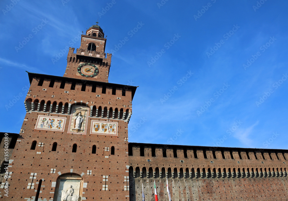 big clock tower of Castle called Castello Sforzesco in Milan Ita