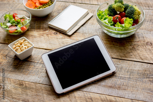 concept diet and tablet with vegetables mock up