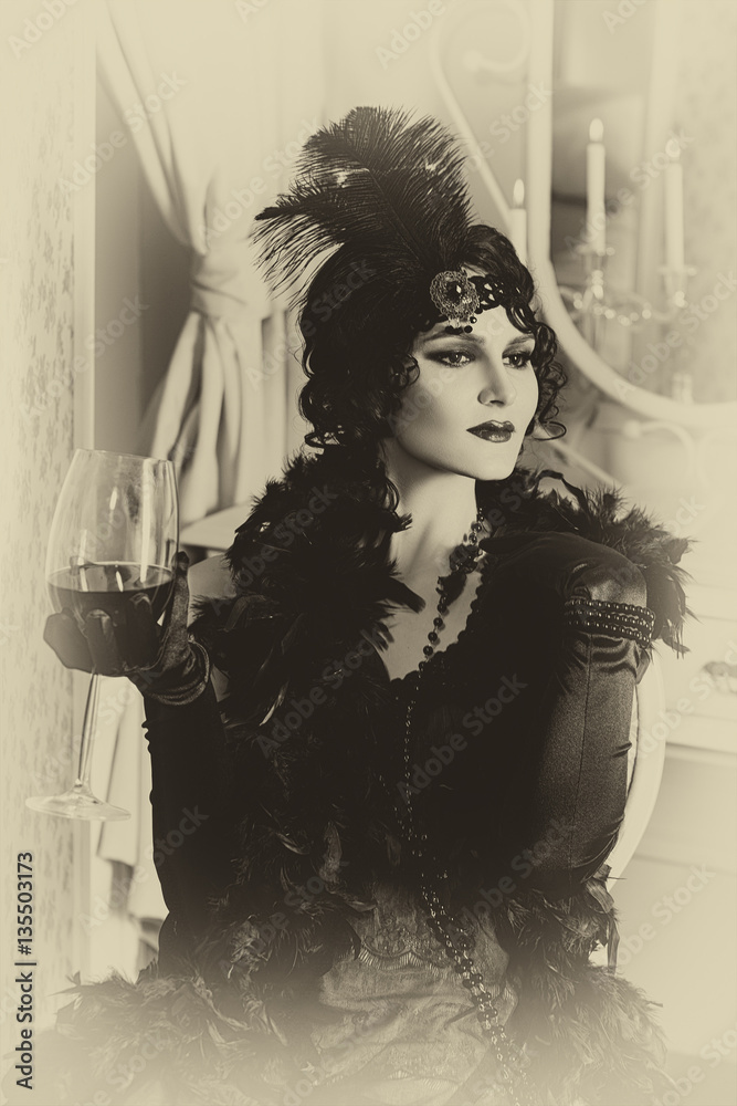 Obraz premium Beautiful woman, portrait in retro style . Old photo. Vintage toning.