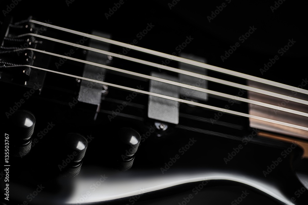 Fototapeta premium Black bass guitar closeup