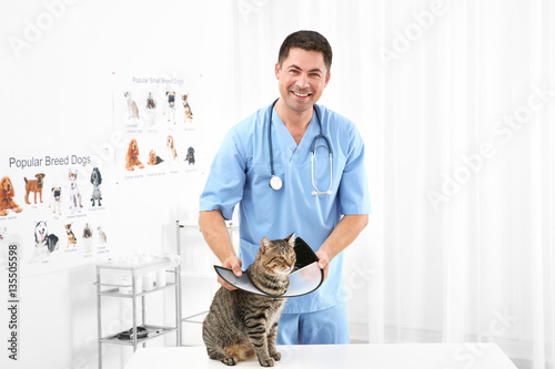 Handsome young veterinarian...