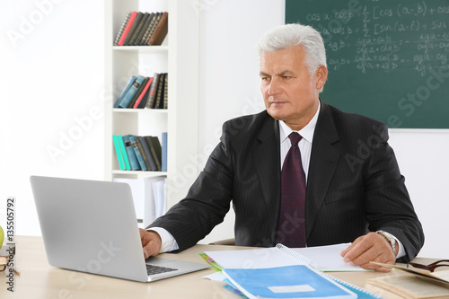 Senior teacher at lesson in...