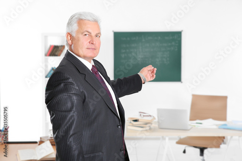 Senior teacher at lesson in...