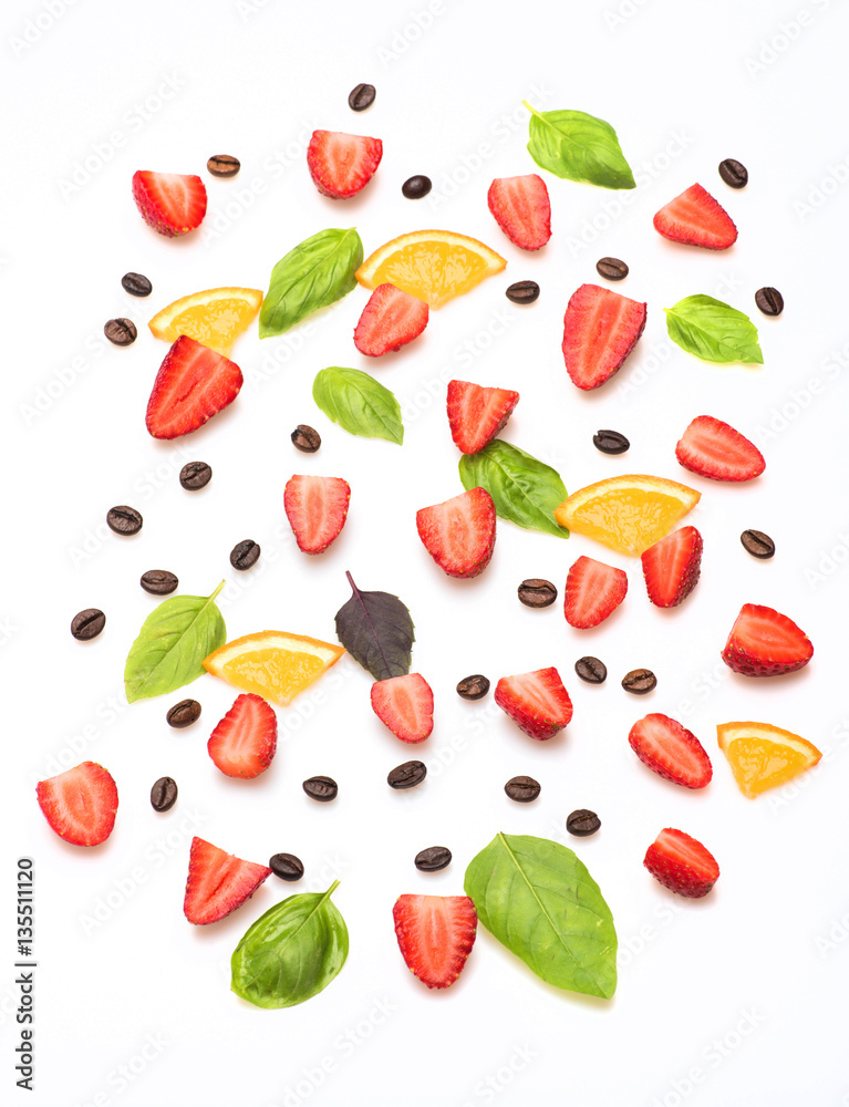 coffee beans, strawberry , orange, sheets of basil on white background coffee beans, strawberry , orange, sheets of basil on white background