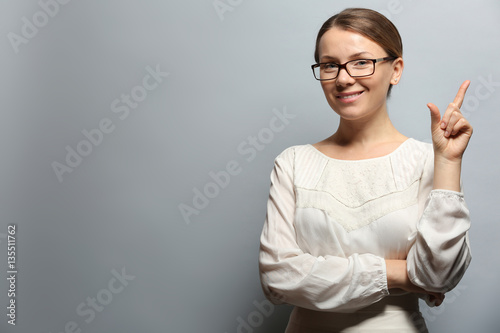 Young woman with spectacles...