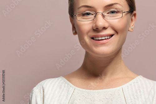Young woman with spectacles...