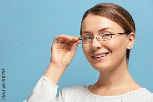 Young woman with spectacles...