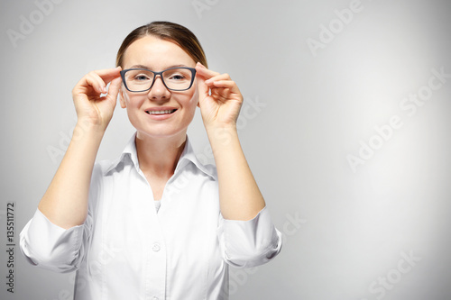 Young woman with spectacles...