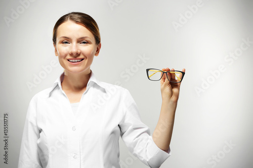 Young woman with spectacles...