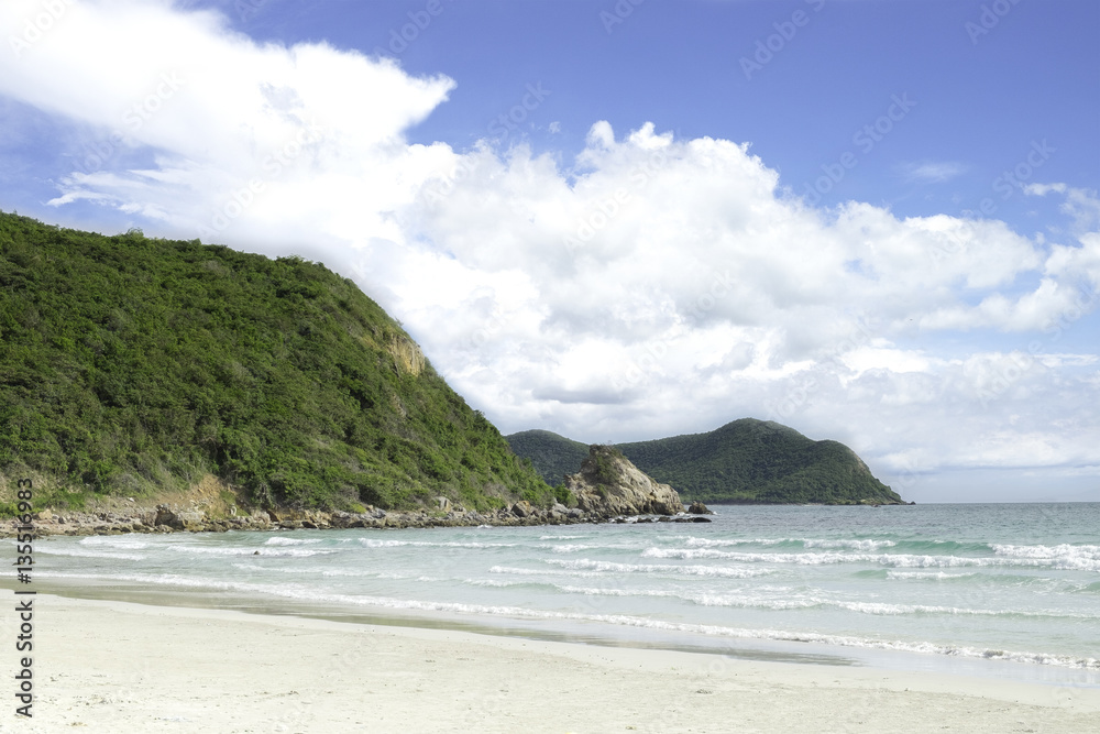 the green big mountain with sea sand sun and the beach on sunshi