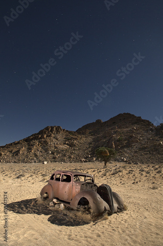 Abandon car in the desert photo