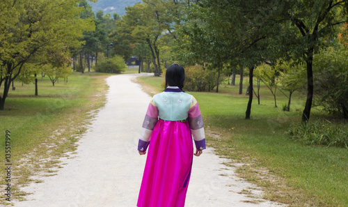 Beautiful girl in Hanbok at Gyeongbokgung, the traditional Korean dress photo