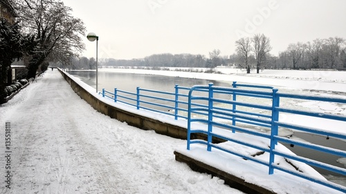 Wideangle view of Ivan Krasko Riverbank and river Vah in Piestany, Slovakia during winter season © zayacsk