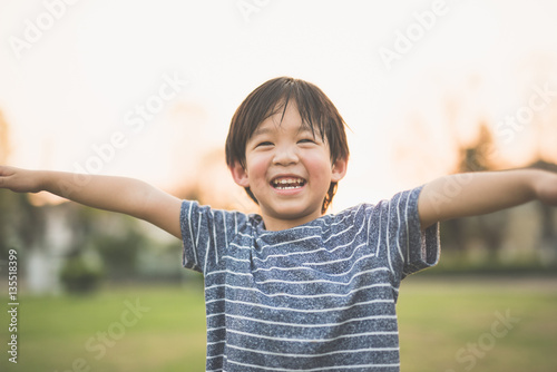 Asian child playing pilot aviator