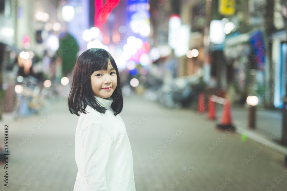 asian girl Girl walking on the night city street asian girl Girl walking on the night city street