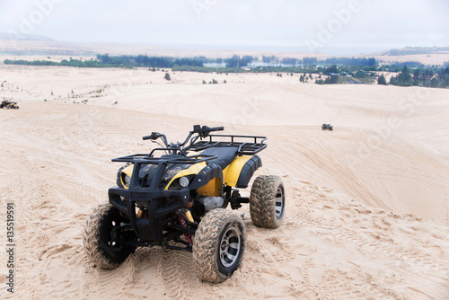 ATV car with white sands. Vietnam desert,Popular tourist attract