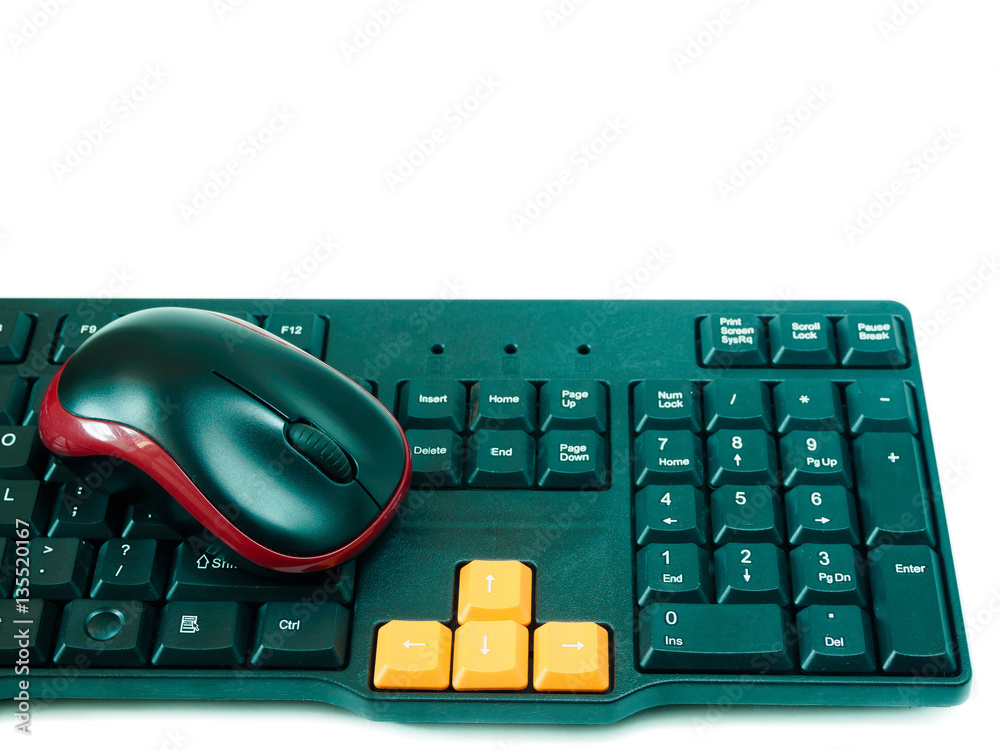 Computer black red mouse and black orange keyboard on white background Computer black red mouse and black orange keyboard on white background