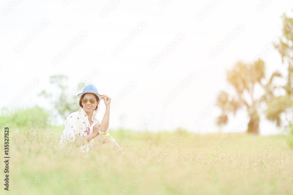 Woman relaxing in the park Woman relaxing in the park