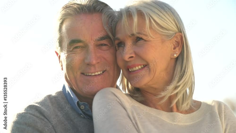 Portrait of senior couple embracing each other