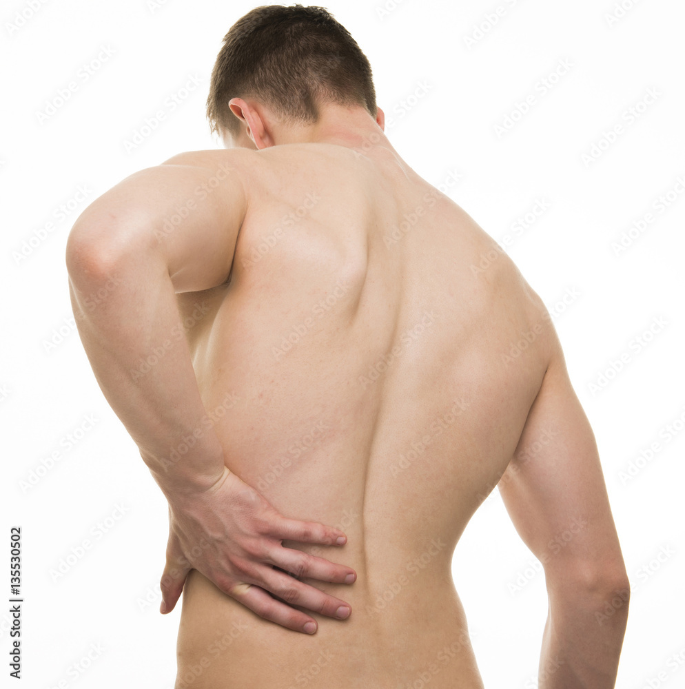 Young man with back pain - Studio shot isolated on white Young man with back pain - Studio shot isolated on white